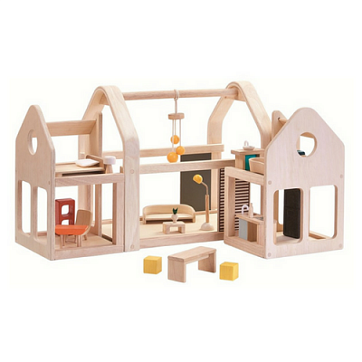 картинка Кукольный двухсекционный дом Plan Toys, с мебелью от магазина konik.ru